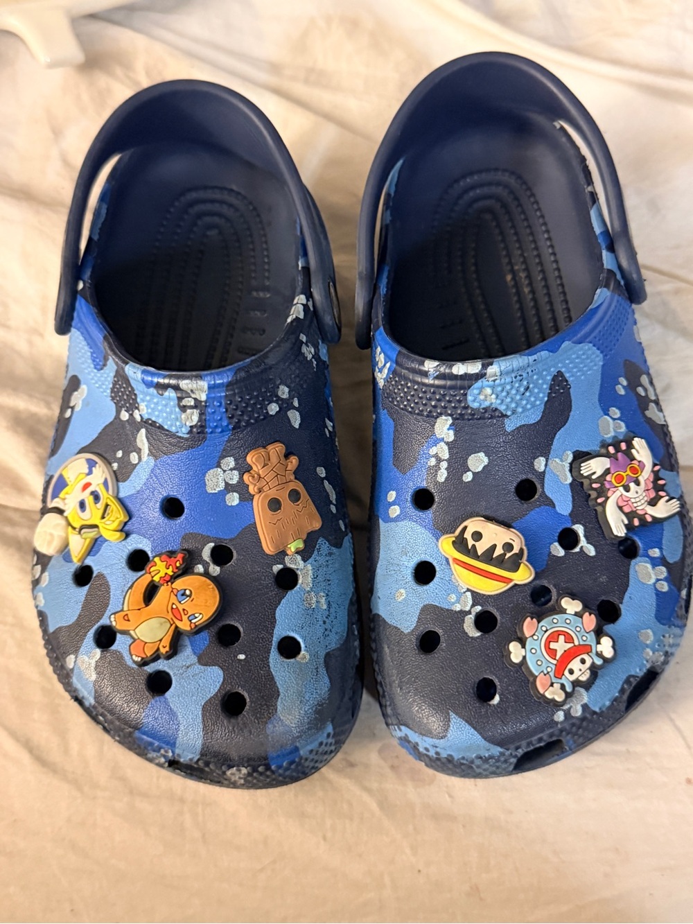 Crocs Blue Camo Slip-On Clogs with Cartoon Charms